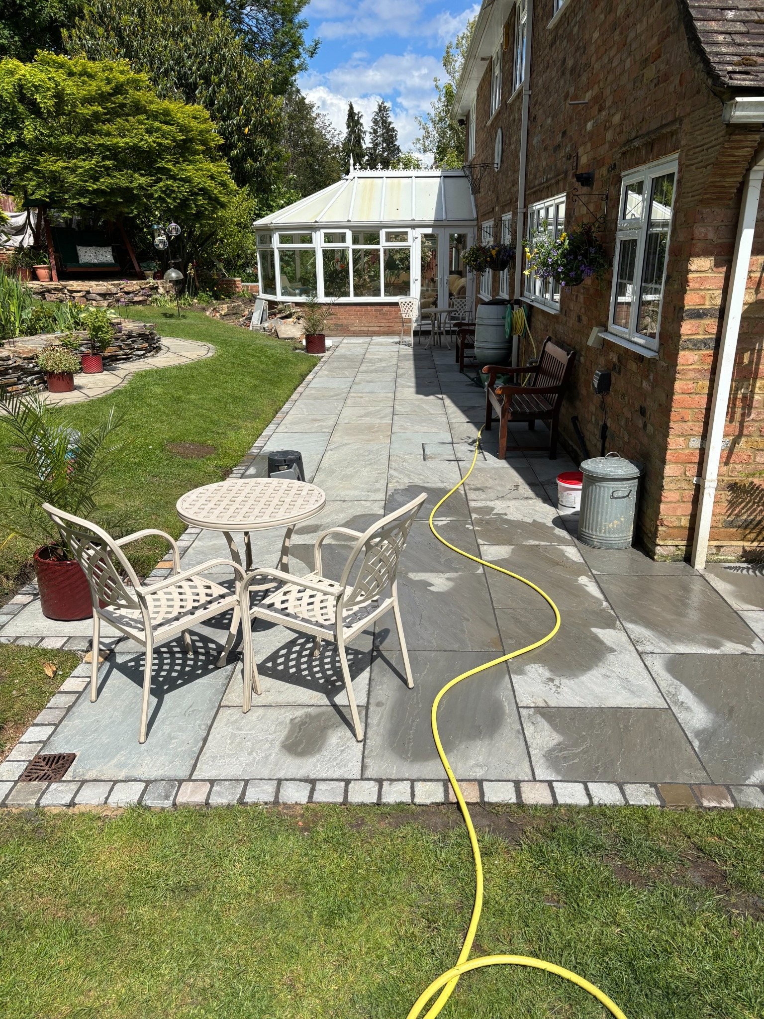 Stone patio and garden seating area